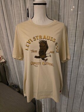 Levi's Cream Short Sleeve Tee with Eagle Graphic and Yellow Accents